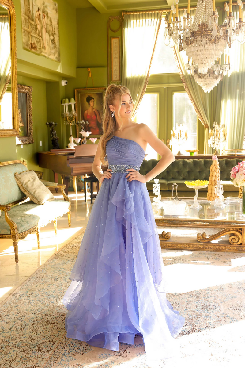 This dress features a one-shoulder design with a beautifully draped bodice and a sparkling waistband that cinches at the waist, creating a flattering silhouette. The flowing skirt is adorned with subtle embellishments, perfect for making a graceful statement at your next formal event.

ARY 29534