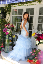 This dress features a one-shoulder neckline with a bodice crafted from lace fabric that adds a touch of sparkle.&nbsp;The skirt features layers of tiered tulle ruffles that cascade down, creating a voluminous silhouette. Perfect for formal events, this dress is ideal for your next prom or pageant.

ARY 29254