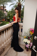 This fully beaded long gown features a plunging neckline and a contrasting bodice and skirt design. The fitted bodice accentuates the figure, while the embellished skirt adds texture and elegance. A side slit completes the look, making this gown perfect for prom or any formal event where you want to make a bold and chic statement.

ARY 47041