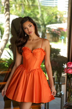 Flirty and feminine, this cocktail dress features a ruched bustier bodice with corset-style structure and a playful A-line skirt.

ARY 26314
