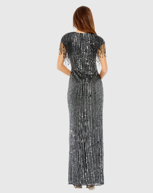 This dress features a high neckline with fringe cap-sleeves, a fully covered back with a fitted silhouette. The embellished sequin fabric adds glam to this stunning modest dress that could be ideal for your next prom or pageant.

Mac Duggal 5971