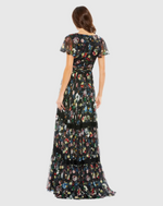 This floral print pleated wrap butterfly sleeve maxi dress features a floral print and flattering pleats, with a V-neckline and a cap sleeve. Style this dress to make it your own at your next prom or formal event.

Mac Duggal 67934