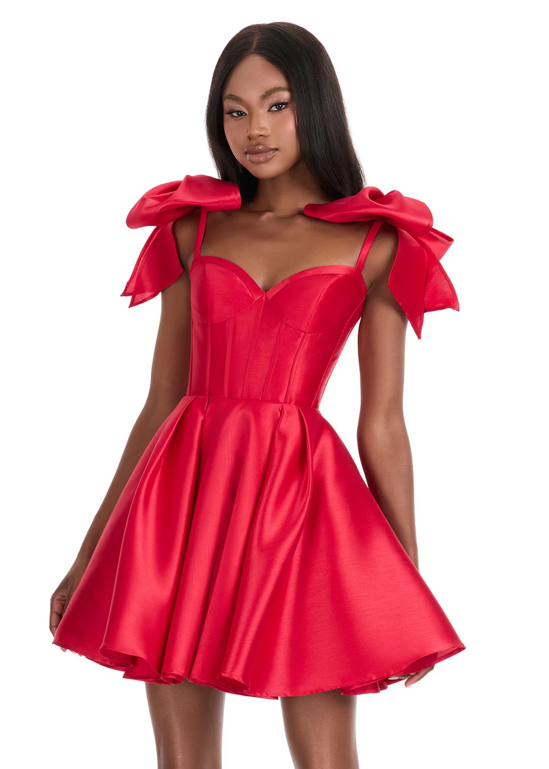 This cocktail dress is made from structured mikado fabric. Sweetheart neckline, oversized bow sleeves, and a flared skirt come together for a fun, feminine look that could be ideal for your next homecoming or formal event.

Ashley Lauren 4855