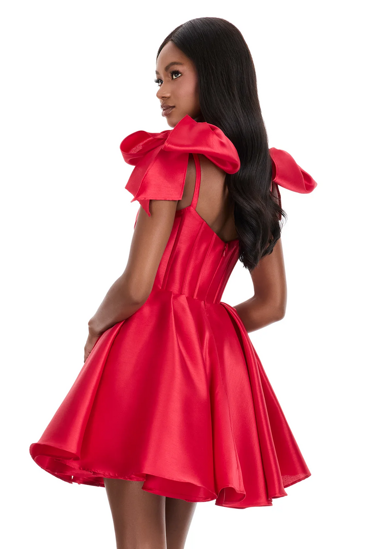 This cocktail dress is made from structured mikado fabric. Sweetheart neckline, oversized bow sleeves, and a flared skirt come together for a fun, feminine look that could be ideal for your next homecoming or formal event.

Ashley Lauren 4855