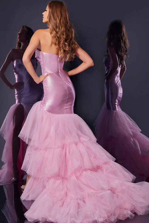 This dress features a strapless sweetheart neckline with a mermaid silhouette. The skirt has layered tulle fabric creating that stylish fit and flare. Choose this unique gown for your next prom or formal event.

Jovani D5315A