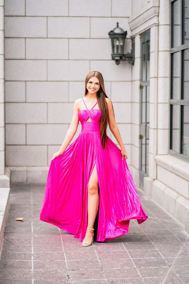 This Sherri Hill gown features a rich metallic pleated fabric with key hole bodice, braided straps and high skirt slit. With a fitted waistline and lightweight fabric, this dress is ideal for your next prom of formal event!

Sherri Hill 55930