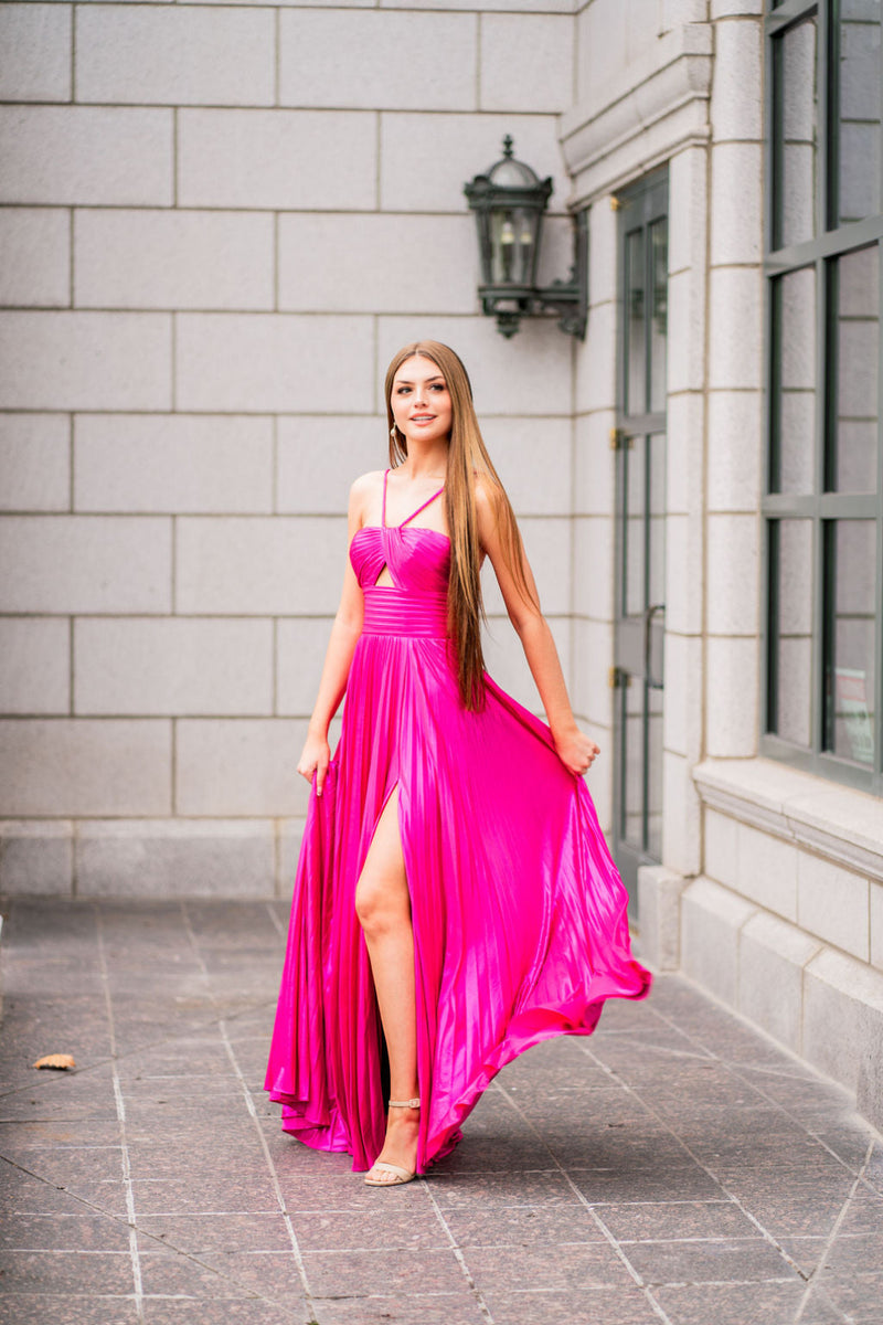 This Sherri Hill gown features a rich metallic pleated fabric with key hole bodice, braided straps and high skirt slit. With a fitted waistline and lightweight fabric, this dress is ideal for your next prom of formal event!

Sherri Hill 55930