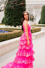 This beautiful Sherri Hill gown features a tulle sequin a-Line gown with sheer corset bodice, off-the-shoulder straps and ruffle high slit skirt. Pair this dress with simple accessories to complete your prom look.

Sherri Hill 55500