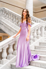 This Sherri Hill gown features silky stretch satin fabric with a corset top, and rosette embellished straps. This dress has a fitted silhouette with a slight train, it is feminine and sophisticated and may be ideal for your next prom or formal event.

Sherri Hill 56090