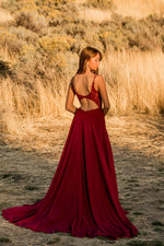 This fun chiffon gown features a semi-sheer lace bodice with a flowy skirt. Gwen also has an open back with delicate applique, making it the perfect dress for your upcoming prom.&nbsp;

DJ&nbsp;A10364
