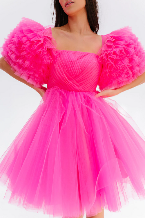 This cocktail dress features soft tulle fabric, fully boned corset and built-in pads, a pleated bodice, mini layered skirt, puffy ruffled sleeves, and a lace-up back. This is a playful choice for your next homecoming or formal event.

AG 11007
