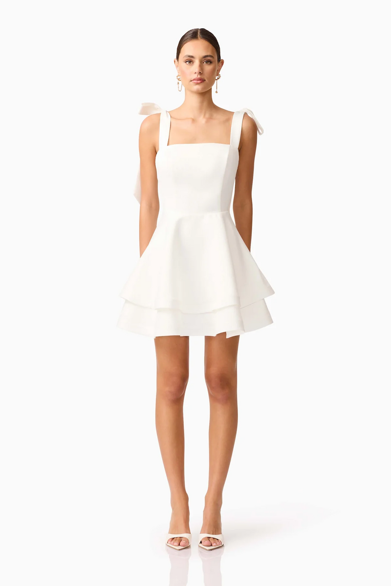 Cut from structured&nbsp;duchess satin, this crisp mini dress is fully lined for a smooth, supportive fit. The&nbsp;straight neckline&nbsp;lends a clean, minimalist silhouette, while the&nbsp;adjustable tie straps&nbsp;allow for a personalised, delicate touch. Choose this cocktail dress for your next homecoming or formal event.

ELT E3092548