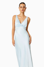 This midi slip dress features a plunge neckline with a gathered front, gold hardware and luxe satin fabrication. This dress is effortless and could be perfect for your next homecoming, or formal event.   ELT EC8052421