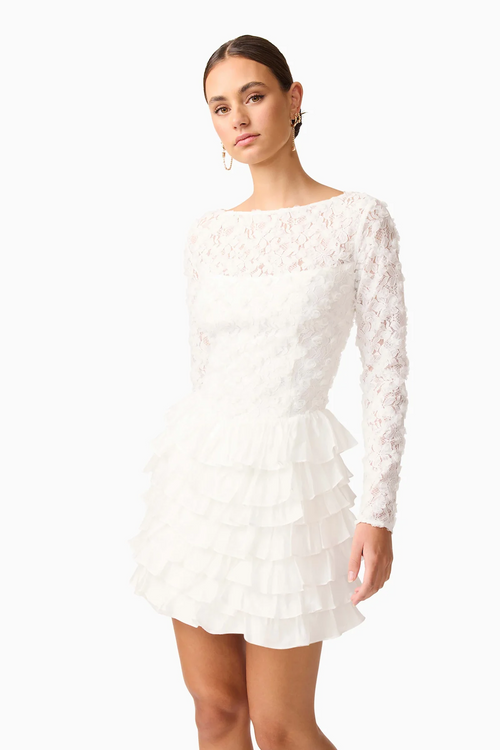 This long sleeve mini dress with a fitted silhouette features frills on the hip for a soft, sculptural accent with lace/tencel organza fabrication for texture. This modest cocktail dress is an excellent choice for your next homecoming or formal event.

ELT EH3092540