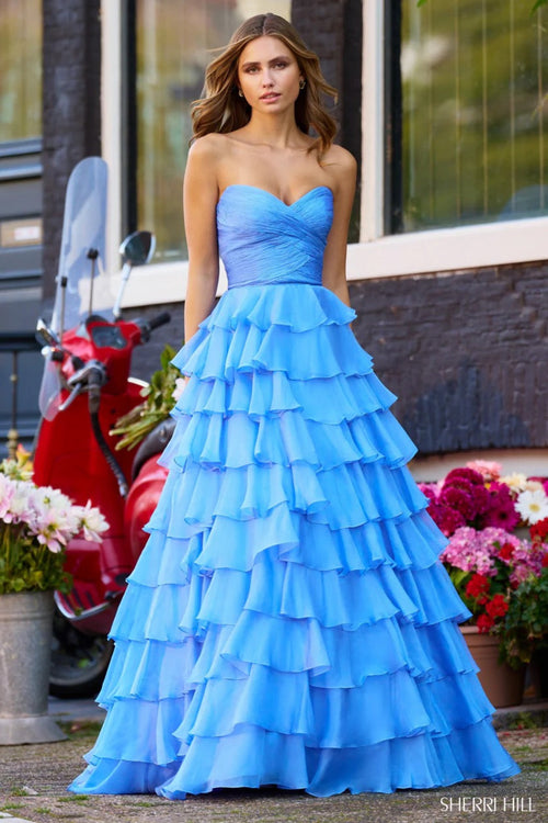This Sherri Hill gown features a stunning strapless sweetheart neckline and ruffle chiffon A-Line silhouette. Pair with fun statement earrings for the perfect prom look.&nbsp;

Sherri Hill 56346