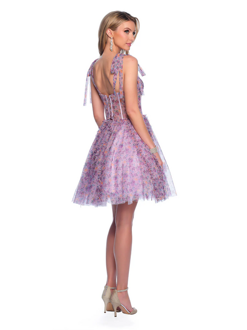 This cocktail dress features a floral print chiffon fabric with a sheer corset bodice and lace-up back. The straps tie into bows at the top of the shoulder and the skirt features gathered fabric to create a 3D texture to this A-line silhouette. This dress is feminine and unique and could be ideal for your next homecoming, sweethearts or formal event.  DJ 11752