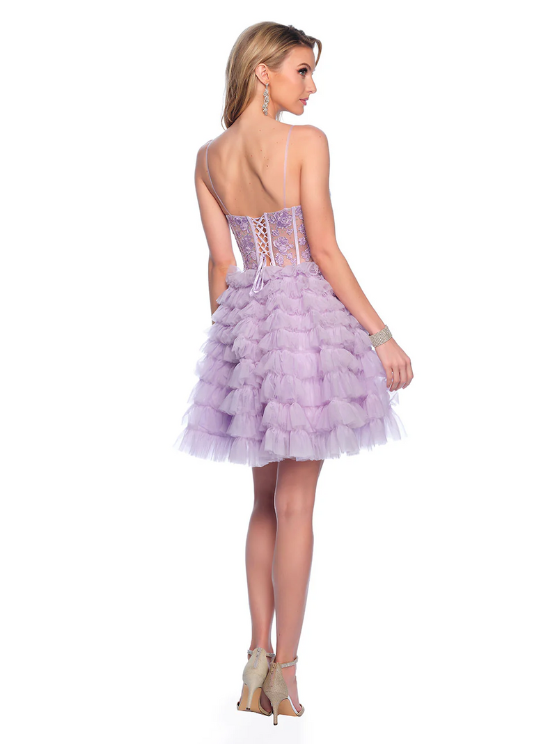 This cocktail dress features spaghetti straps, a sheer corset bodice with lace applique and a lace-up back. The skirt has tiered ruffles creating and A-line silhouette. This dress is feminine and playful and could be just the vibe for your next homecoming or formal event.  DJ 11766