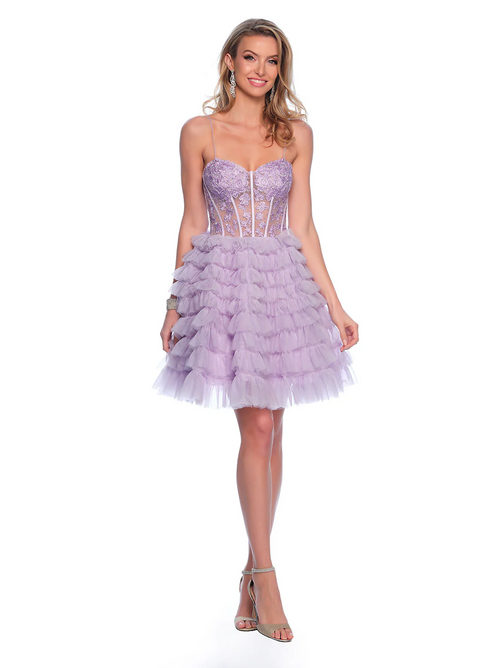 This cocktail dress features spaghetti straps, a sheer corset bodice with lace applique and a lace-up back. The skirt has tiered ruffles creating and A-line silhouette. This dress is feminine and playful and could be just the vibe for your next homecoming or formal event.  DJ 11766