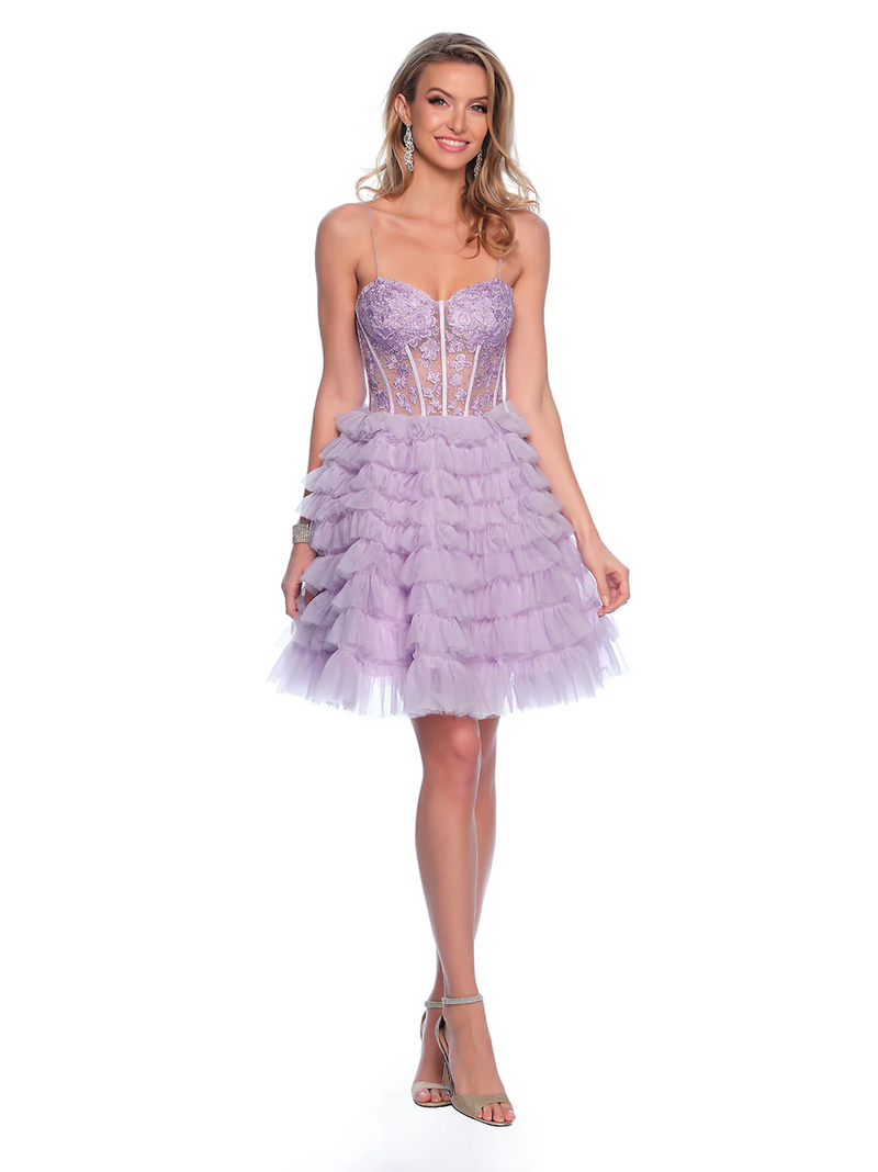 This cocktail dress features spaghetti straps, a sheer corset bodice with lace applique and a lace-up back. The skirt has tiered ruffles creating and A-line silhouette. This dress is feminine and playful and could be just the vibe for your next homecoming or formal event.  DJ 11766