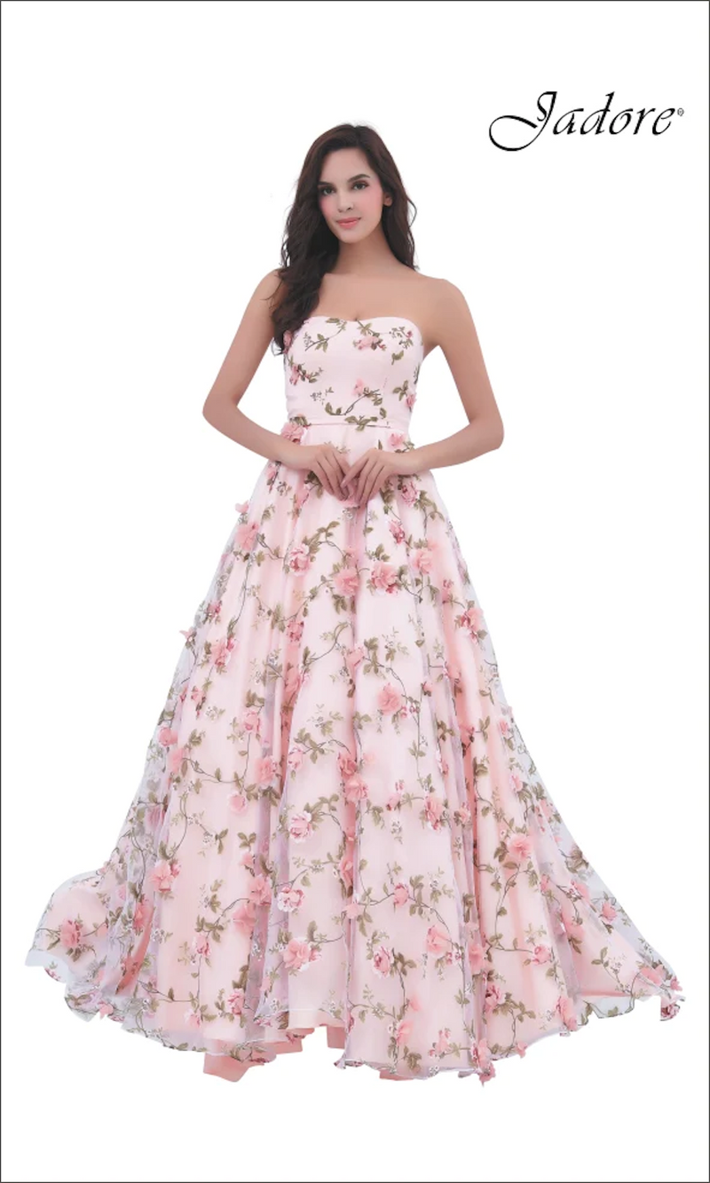 This dress features a strapless neckline with floral embroidery and 3D floral applique. This gown has an A-line silhouette with a voluminous skirt. This gown is ethereal and ideal for your next prom or formal event.  JAD J11343