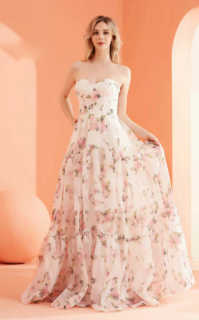 This dress features a strapless sweetheart neckline with a drop waistline that flows into an A-line silhouette. The fabric has a subtle floral print which may be ideal for your next prom or formal event!

JAD J22008