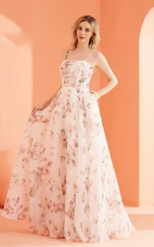 With thin spaghetti straps, this dress features a fitting bodice with intricate details, a straight neckline and an A-line silhouette with a unique fabric print. Choose this dress for your next prom or formal event!

JAD&nbsp;J22009