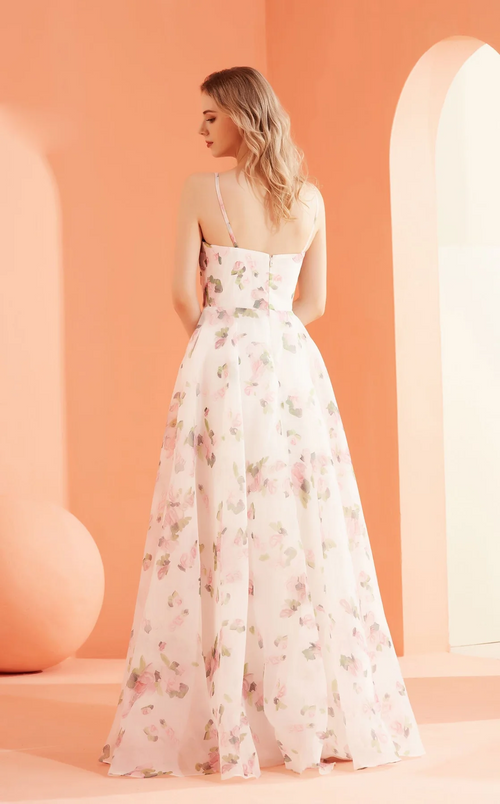 With thin spaghetti straps, this dress features a fitting bodice with intricate details, a straight neckline and an A-line silhouette with a unique fabric print. Choose this dress for your next prom or formal event!

JAD&nbsp;J22009