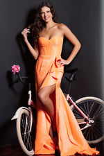 This dress features a strapless neckline, a bodice with corset boning, a pleated side detail opening up to the slit, and a fitted silhouette. This dress is modern and vibrant. Style this dress to make it your own at your next prom or formal event.   Jovani JVN38429A