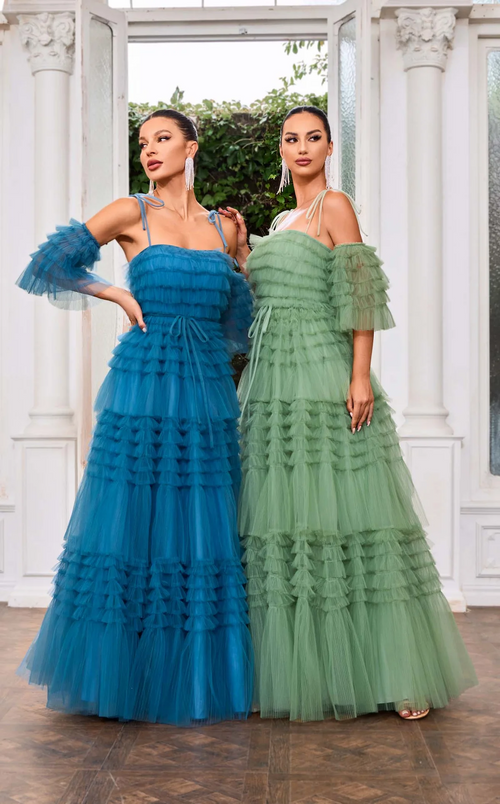 This dress features spaghetti straps and a straight across neckline with a ruffled A-line silhouette that adds a playful touch to the bodice and skirt. This dress also has removable sleeves for your convenience.

JAD J24043