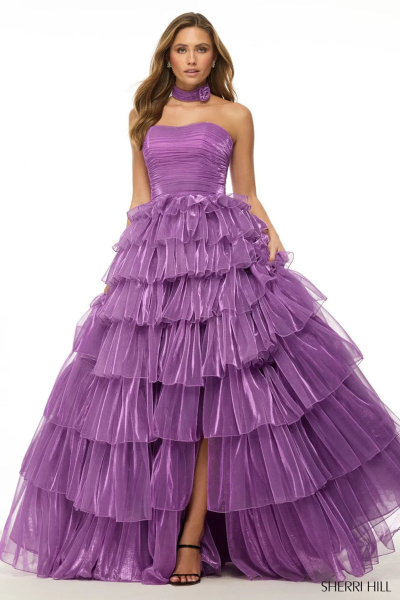 This stunning Sherri Hill gown features a strapless neckline, ball gown silhouette, with a ruffle skirt and rosette choker. Pair this dress with dainty heels for the perfect prom look.&nbsp;

Sherri Hill 57188