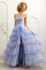 This gown features a strapless ball gown silhouette, illusion corset bodice, lace embroidery, sequin applique, and a tiered tulle skirt. Pair this dress with some simple heels for a unique prom look.&nbsp;

ACE 4033