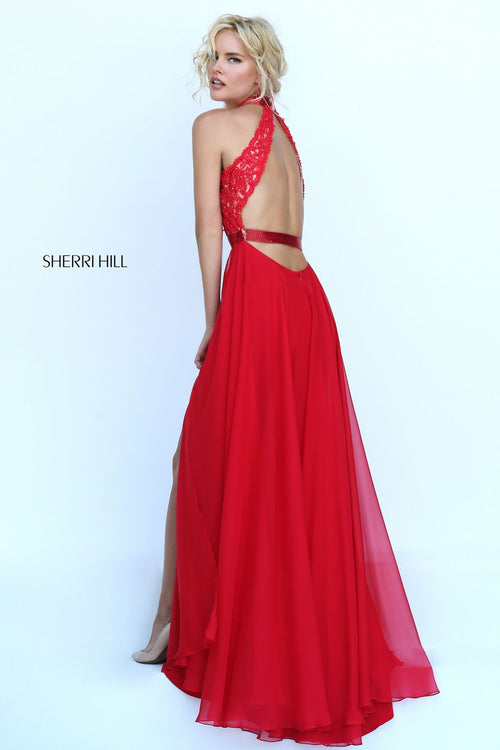 This flowy halter gown features a lace bodice with chiffon skirt. This boho inspired dress would be perfect for your next event.  Sherri Hill 50223