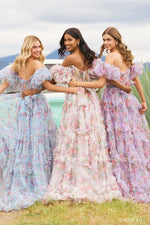 <p><span>This gown features tulle floral print fabric with a sheer corset bodice with ruffle embellishments and balloon sleeves. The neckline is off-the-shoulder, with a belt tie along the waistline and the skirt has ruffle detailing throughout. This dress has a romantic, boho-vibe which may be perfect for your next prom or formal event.</span></p> <p>Sherri Hill 55541</p>