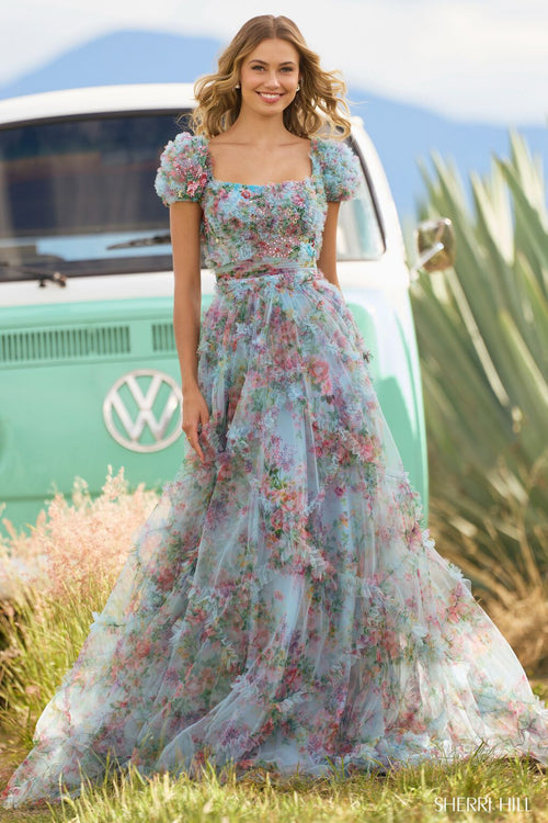 <p><span>This gown features tulle floral print fabric with a bead embellished bodice, ruffle embellishments on the bodice and skirt, cap sleeves, and a lace-up back. This dress is romantic and could be perfect if you are looking for extra coverage for your next prom or formal event.</span></p> <p>Sherri Hill 55560</p>