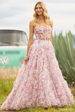 <p><span>This strapless gown features floral tulle print fabric with ruffle embellishments throughout the bodice and skirt. The sheer bodice has corset boning with a tie along the waistline. This dress is boho and romantic and could be perfect for your next prom or formal event.</span></p> <p>Sherri Hill 55623</p>