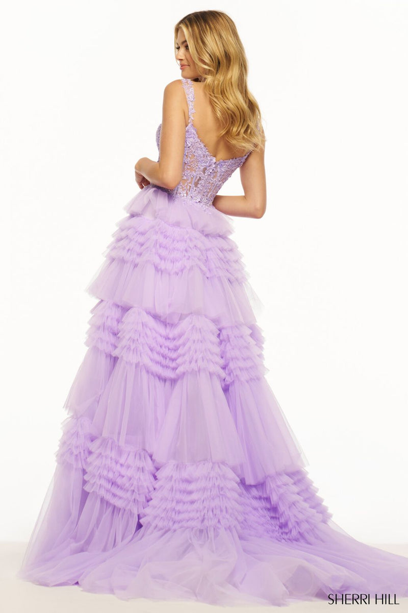 This Sherri Hill ballgown features tulle ruffle fabric with a lace corset bodice. Make a statement at your next prom or formal event in this stunning dress.   Sherri Hill 56019