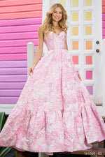 This Sherri Hill ballgown features a strapless neckline, brocade textured fabric and a corset bodice. This fabric is a statement and creates depth and interest. This could be the ideal choice for your next prom or formal event!  Sherri Hill 56055