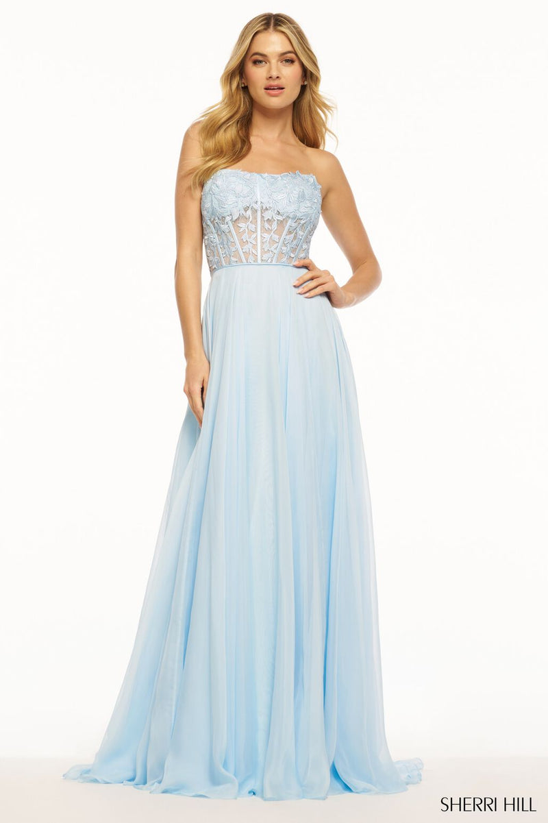 This dress features a strapless neckline with a leaf lace corset and an A-line chiffon skirt. This dress is classic and timeless. Style this dress to make it your own at your next prom or formal event.  Sherri Hill 56088