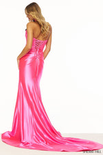 This Sherri Hill gown features a strapless neckline, corset with a ruched bodice, flower embellishments, high slit and a lace-up back. This dress also features a slight train for that extra elegance. This dress is distinctive and gives red-carpet vibes which could be the perfect fit for your next prom or formal event!  Sherri Hill 56119