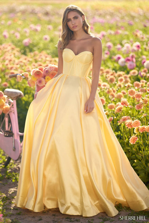 This ballgown features a strapless neckline with mikado fabric with a corset bodice. Style this dress to make it your own at your next prom or formal event!  Sherri Hill 56133