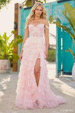 This Sherri Hill gown features a tulle sequin fabric, an A-Line silhouette with a sheer corset bodice, off-the-shoulder straps and a ruffle high-slit skirt. All the details in this dress culminate to create a stunning effect. It's giving the ultimate prom experience.   Sherri Hill 56157