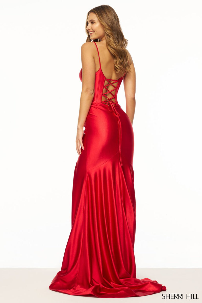 This Sherri Hill gown features stretched satin fabric with a corset bodice, a deep V neckline, a skirt slit and lace-up back. This is a timeless dress that could be perfect for your next prom, pageant or formal event!  Sherri Hill 56158