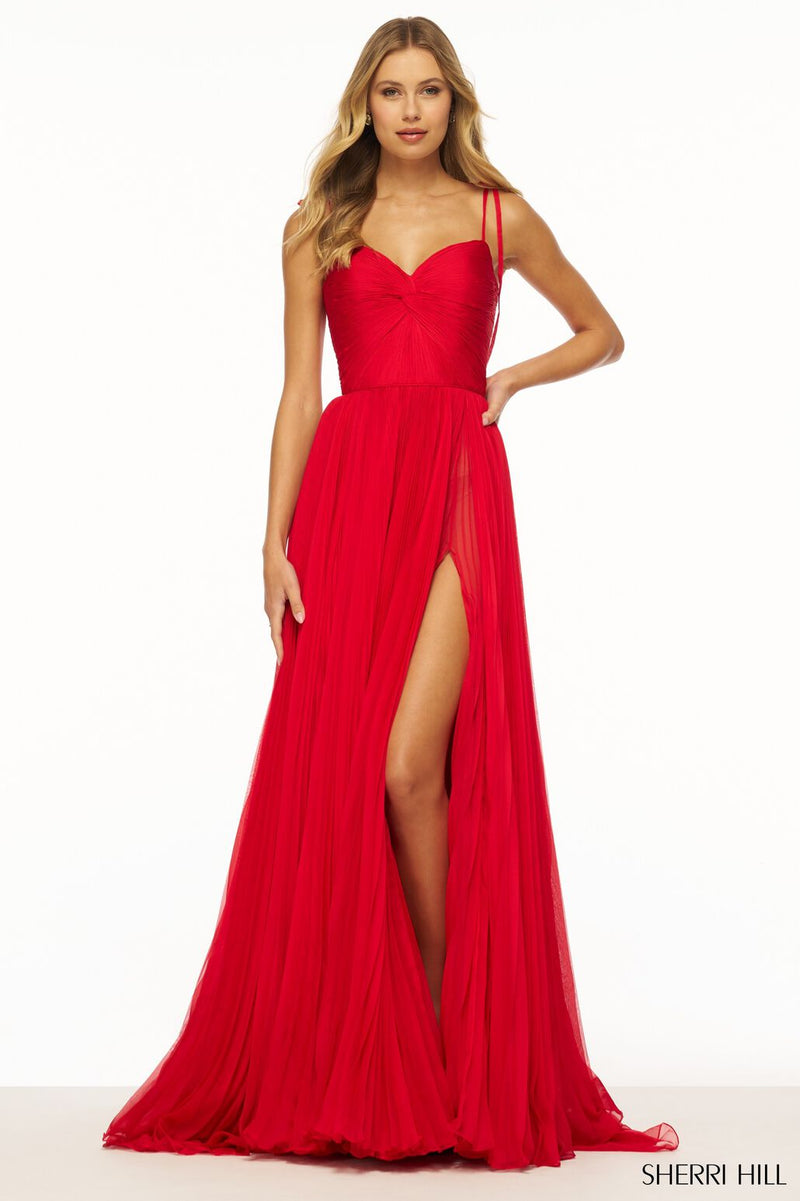 This dress features a sweetheart neckline with a pleated bodice and knot and spaghetti straps.This gown has chiffon fabric that flows effortlessly with skirt slit and train. It is effortless and vibrant and could be perfect for your next prom, pageant or formal event.  Sherri Hill 56267