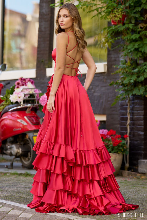 <p>This stunning gown features a straight across neckline with double spaghetti straps and an open lace-up back. The A-line silhouette features a skirt with ruffle tiers adding slight volume and design interest. This dress may be just the vibe for your next prom or formal event.</p> <p>Sherri Hill 56373</p>