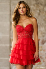 This strapless cocktail gown features a leaf lace corset top, a chiffon ruffle skirt, and a lace-up back. This stunning dress is timeless and could be perfect for your next homecoming, sweethearts or formal event.  Sherri Hill 56501