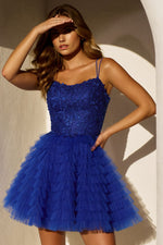 This cocktail dress features a leaf lace embellished bodice with double spaghetti straps, a tiered tulle ruffle skirt and a lace-up back. This dress has texture with a classic silhouette and could be ideal for your next homecoming or formal event.  Sherri Hill 56503
