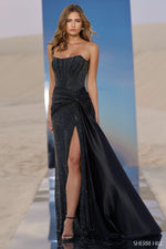 This gown features a strapless neckline with hot fix stones and an over-side skirt and a high slit. The bodice has exposed corset boning creating a flattering fit. This dress is a stunning choice for your next pageant or formal event.&nbsp;

Sherri Hill 56639