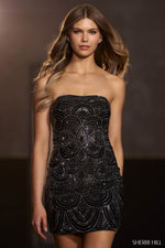 This cocktail dress features a strapless neckline with a cutout back and a lace-up, a fitted silhouette, and unique beaded detailing. This dress can be styled to make it your own at your next homecoming, sweethearts or formal event.  Sherri Hill 56708