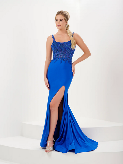 This dress features an embellished scoop neckline with stretch jersey and a lace bodice. The fitted silhouette and high slit may be ideal for your next prom or formal event!  HOW 16058