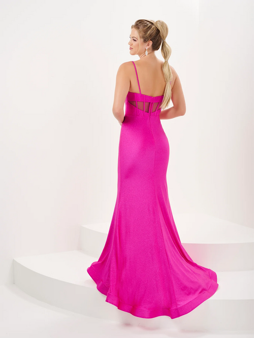 This dress features an illusion plunging neckline, spaghetti straps, a bodice with corset boning, a fitted silhouette and sparkle jersey fabric. This dress is modern and unique and could be your dream prom dress! Or any formal occasion.   HOW 16062